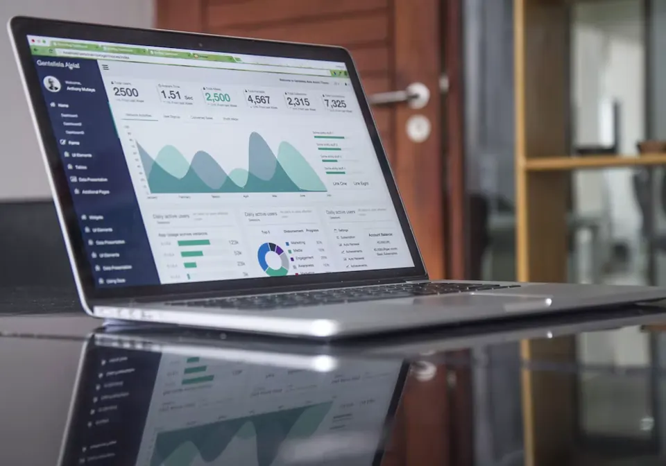 A laptop showing a revenue dashboard